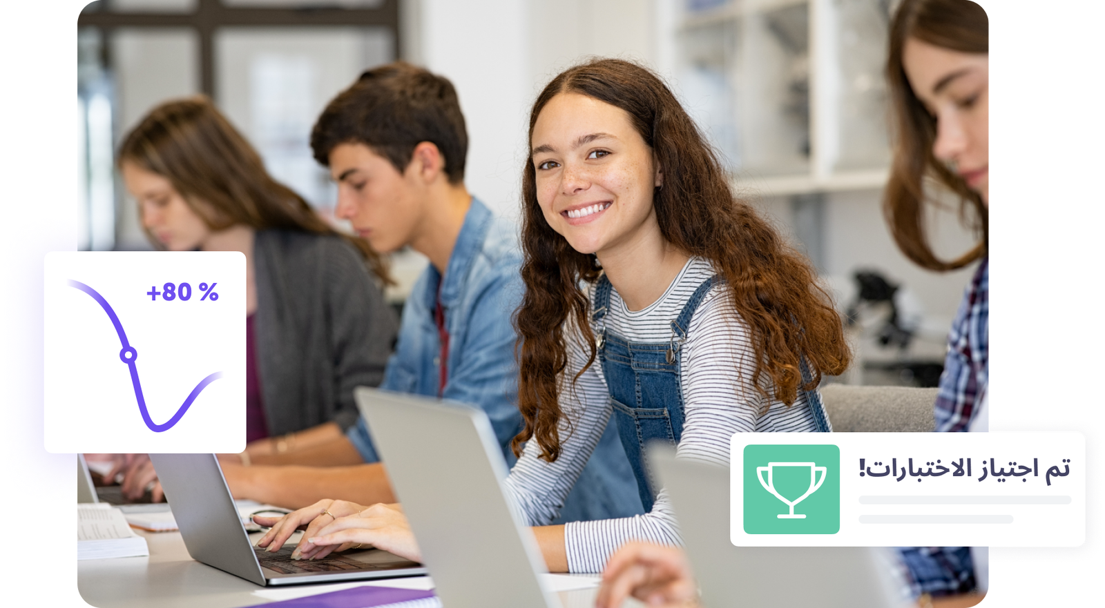 طلاب يدرسون بجد مع تكنولوجيا حديثة وابتسامة شابة تعبر عن النجاح.
