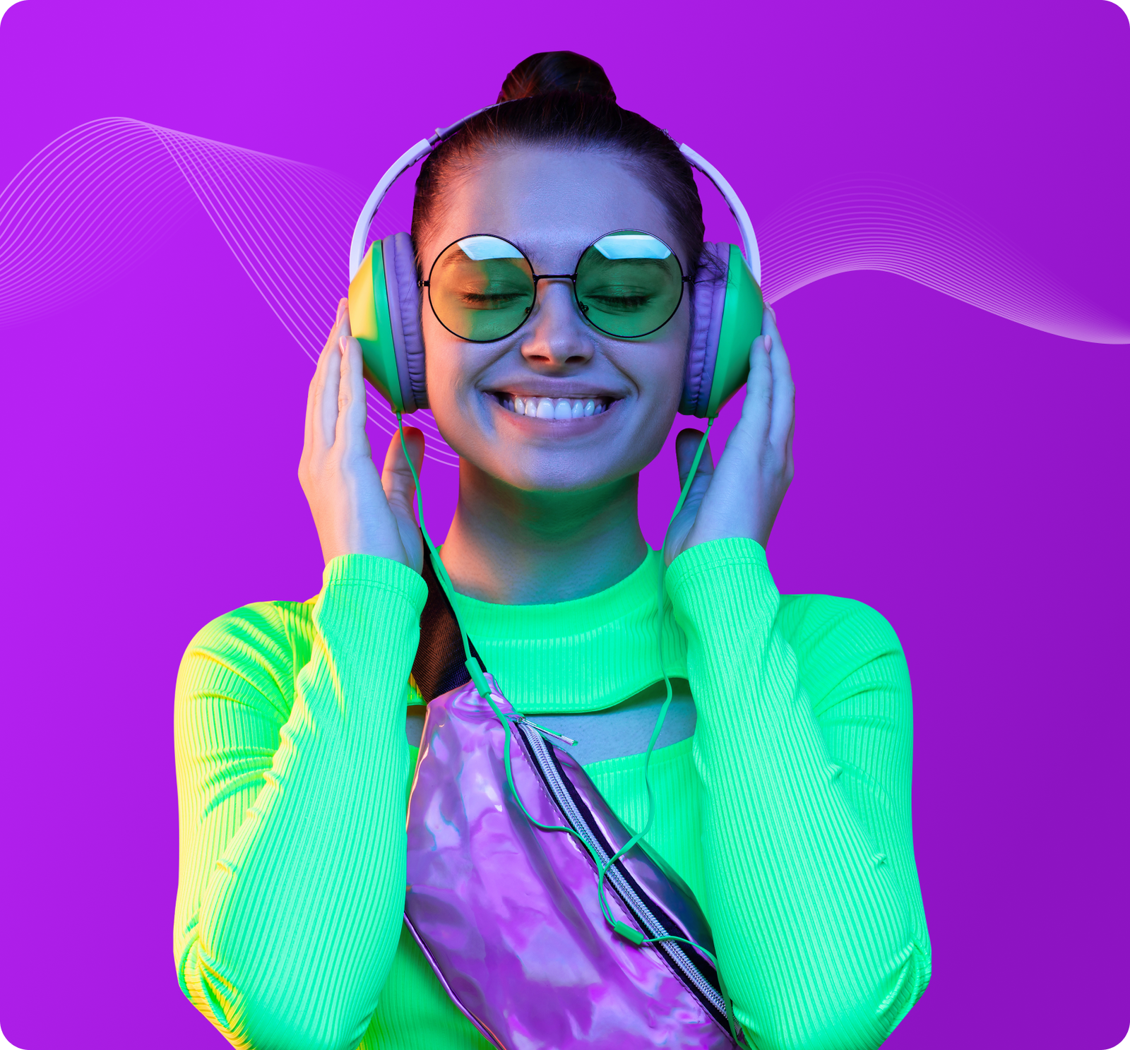 Woman in neon attire enjoying music with headphones against a vibrant purple background.