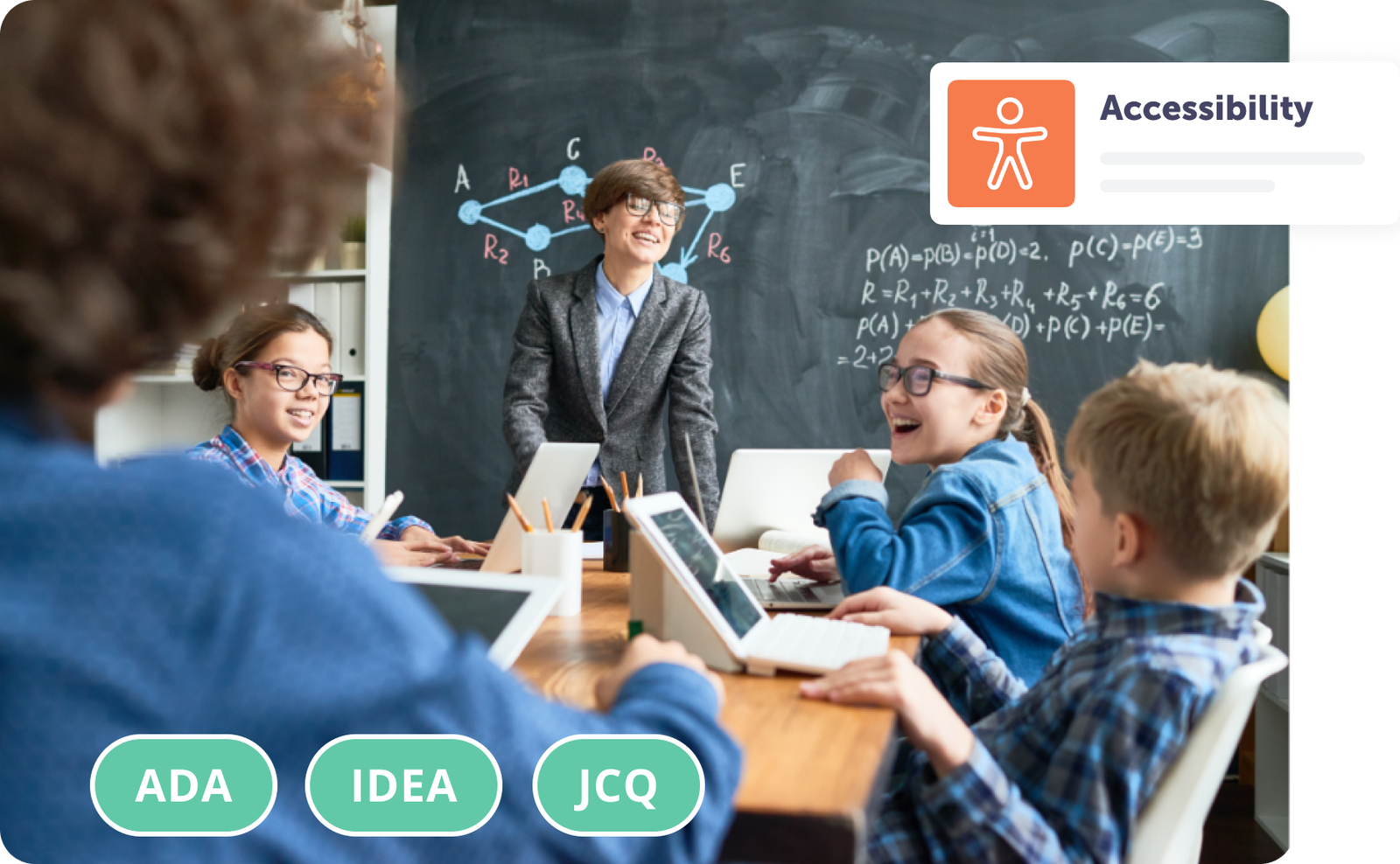 Students engaged in a classroom discussion with a teacher at a chalkboard.