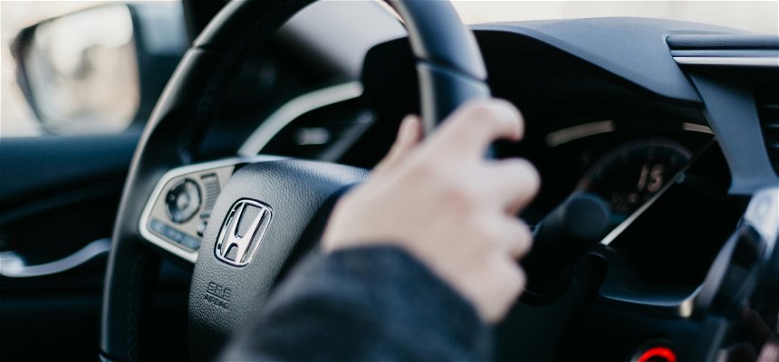 The steering wheel of a Honda car