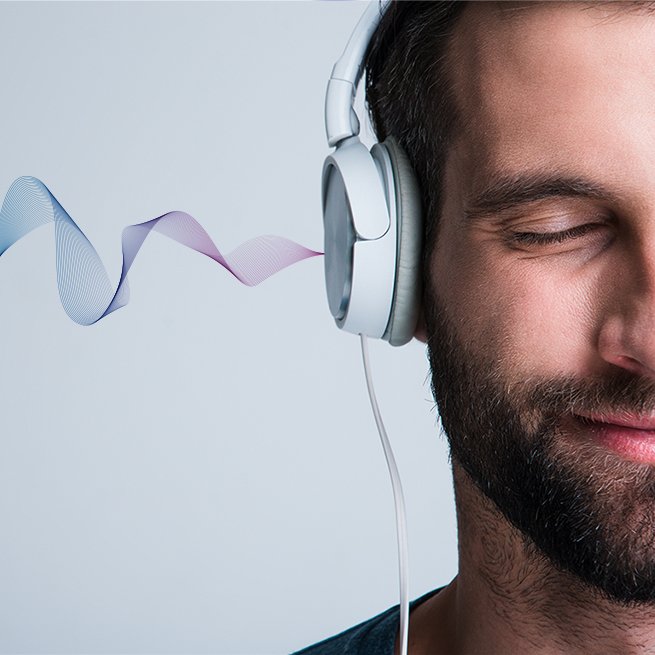 Man listening with headphones and soundwaves