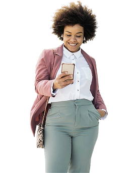 A black woman smiles while looking at her phone