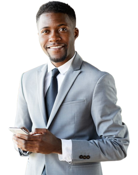 A black business man smiles while holding a smartphone in his hands