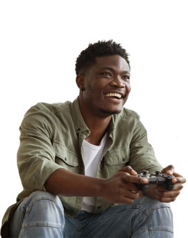 A black man playing video games with a console controller