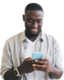 Smiling black man using smartphone