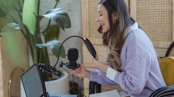 how to make video with text to speech Woman using recording equipment to create a podcast voice over