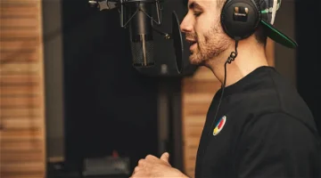 Man recording custom TTS voices: 5 things brand managers should know
