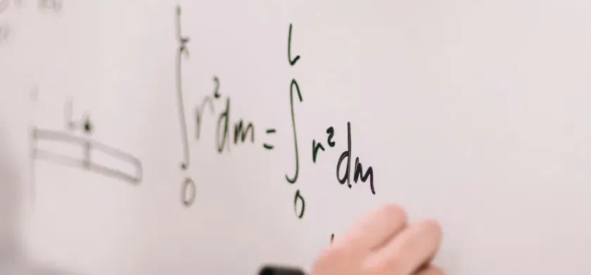 Make STEM accessible with LaTeX and ReadSpeaker - Person writing on white board.