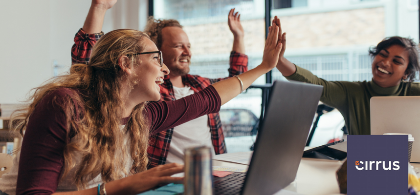 Happy colleagues high-five each other.