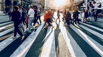 People crossing the road in a city